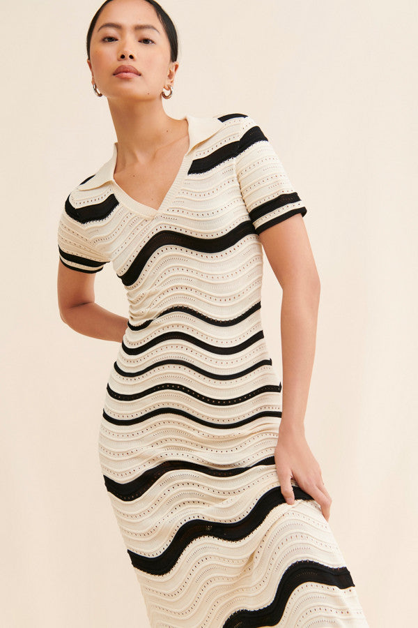 Retro Ripple Dress – bold, fitted, and effortlessly cool.